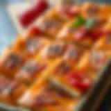 Close-up of golden brown baklava in a rectangular tray