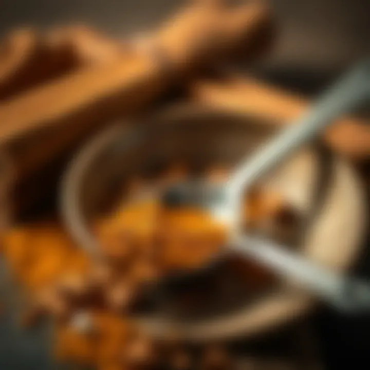 A close-up of cinnamon powder in a small bowl beside a measuring spoon