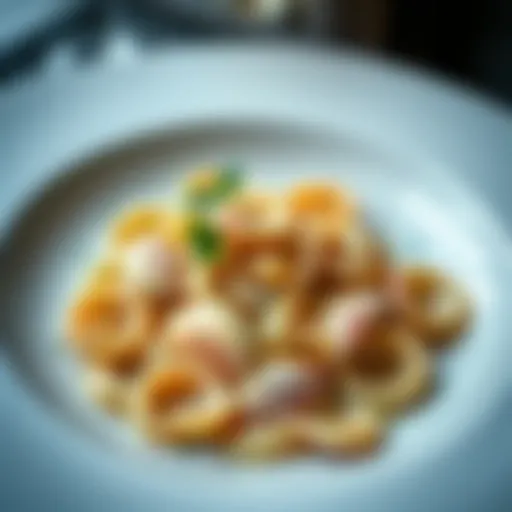 An elegantly plated shell pasta dish garnished with fresh herbs