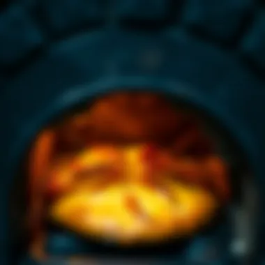 Baked pide emerging from a traditional oven