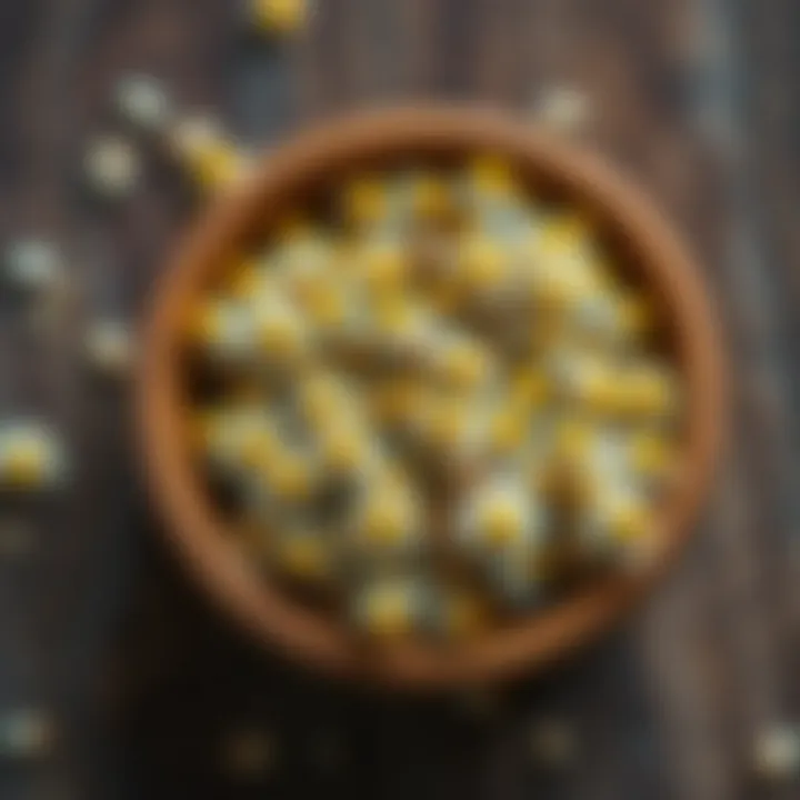 Natural Chamomile Flowers Dried chamomile flowers in a wooden bowl