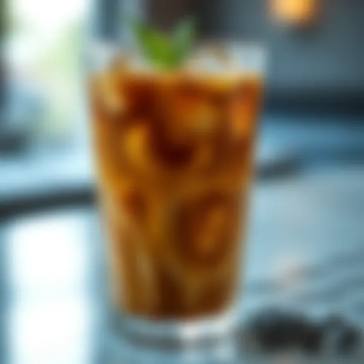 Refreshing cold coffee with ice in a stylish glass